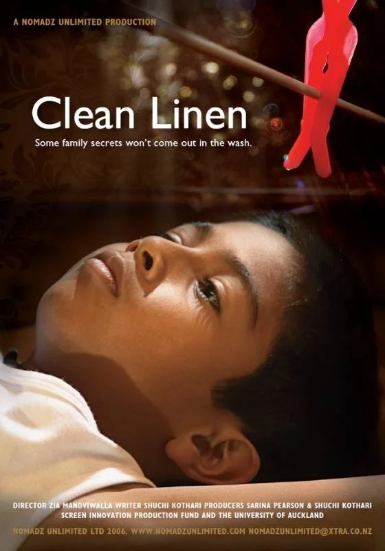 Poster for a short film titled 'Clean Linen' featuring a young boy lying down with his eyes open and a clothespin hanging above his head, with the subtitle 'Some family secrets won't come out in the wash.'