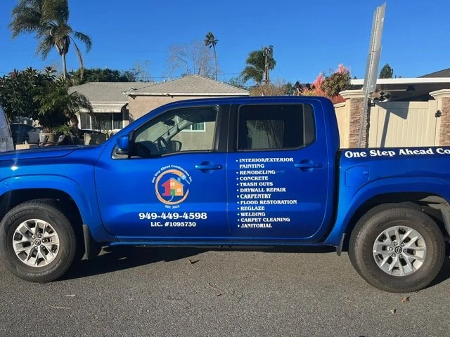 isp-vehicle-decal-one-step-ahead-construction-blue-truck.jpg