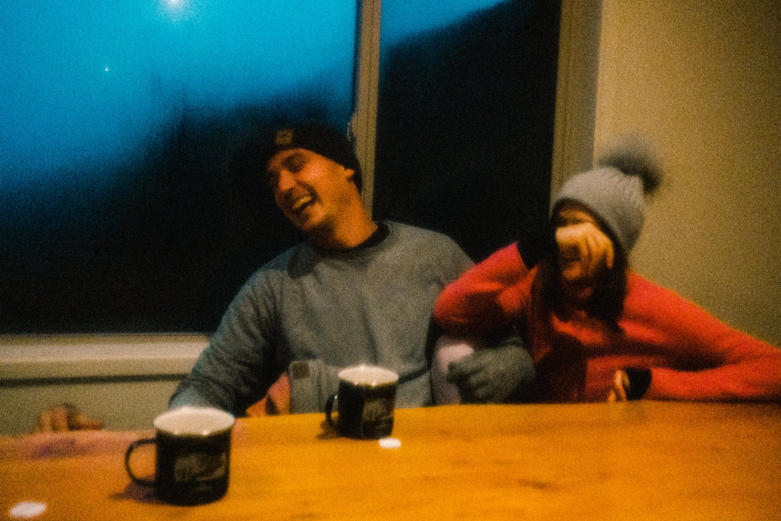 Image of Nathan Ramsey laughing while on a hike with his family