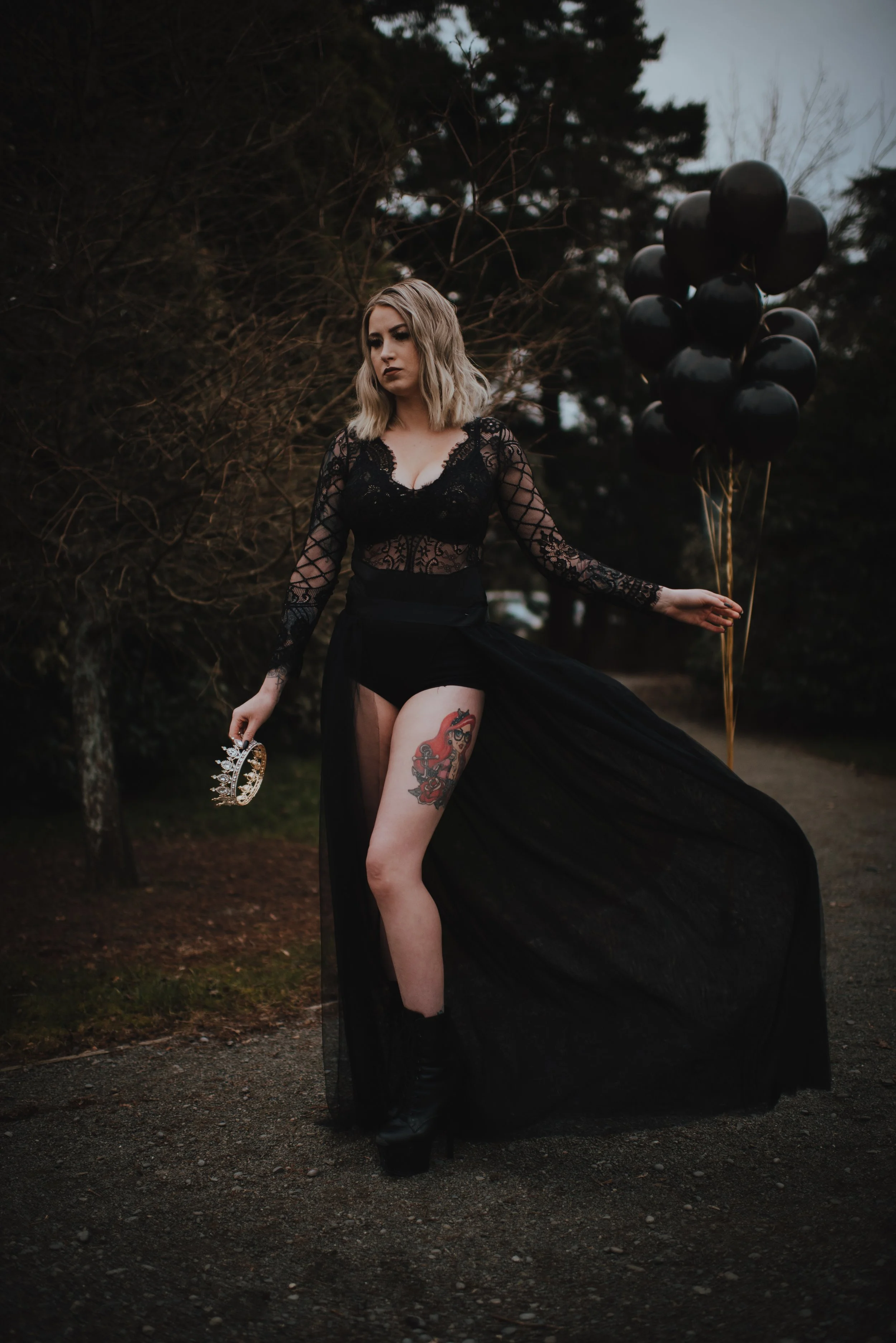 death to my 20's photoshoot with black bodysuit, balloons and cape