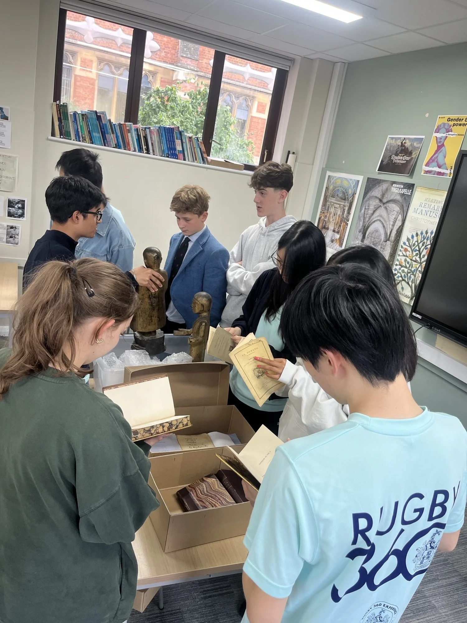 Rugby pupils exploring archival material 2.jpeg