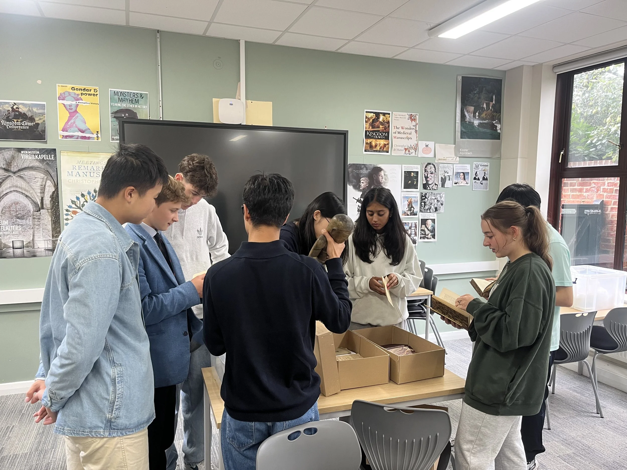 Rugby pupils exploring archival material 1.jpeg