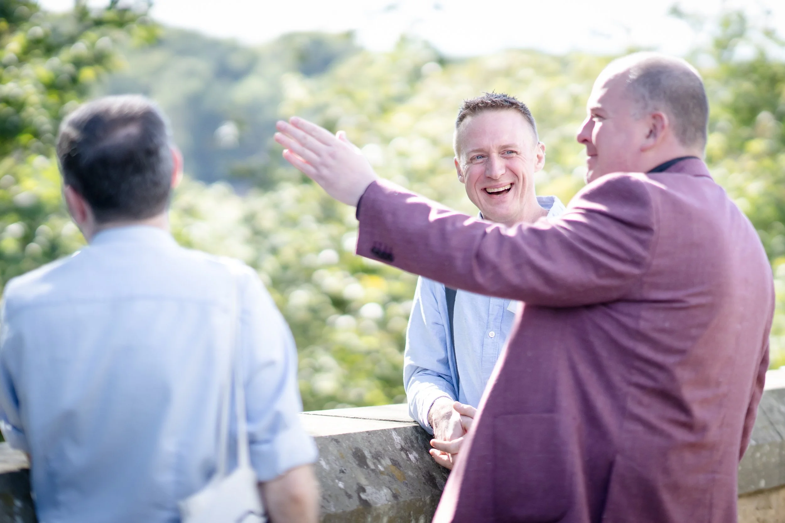 Men connecting at a conference in Edinburgh