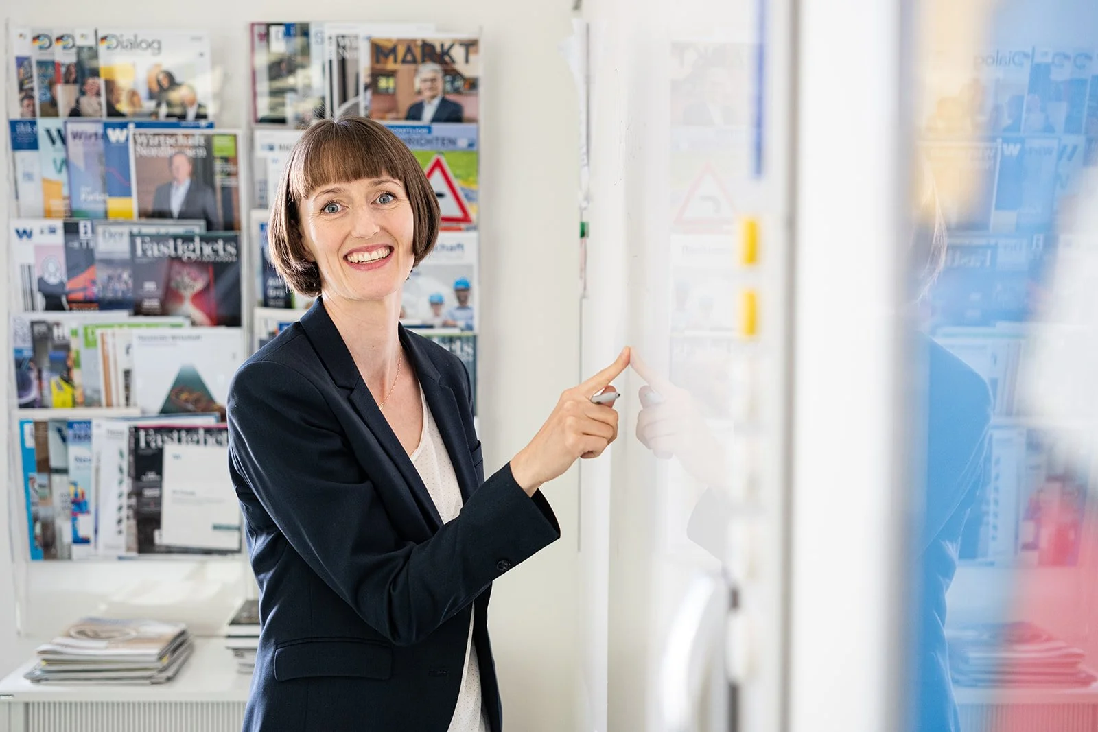 business women in front of white board for image bank 
