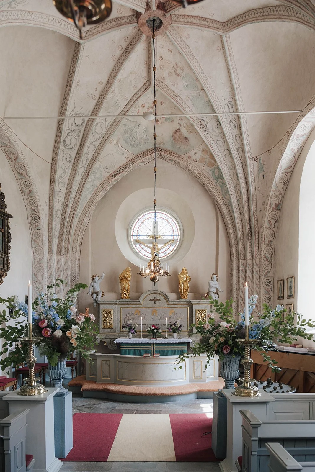 A pale pink church near Ekolsunds slott