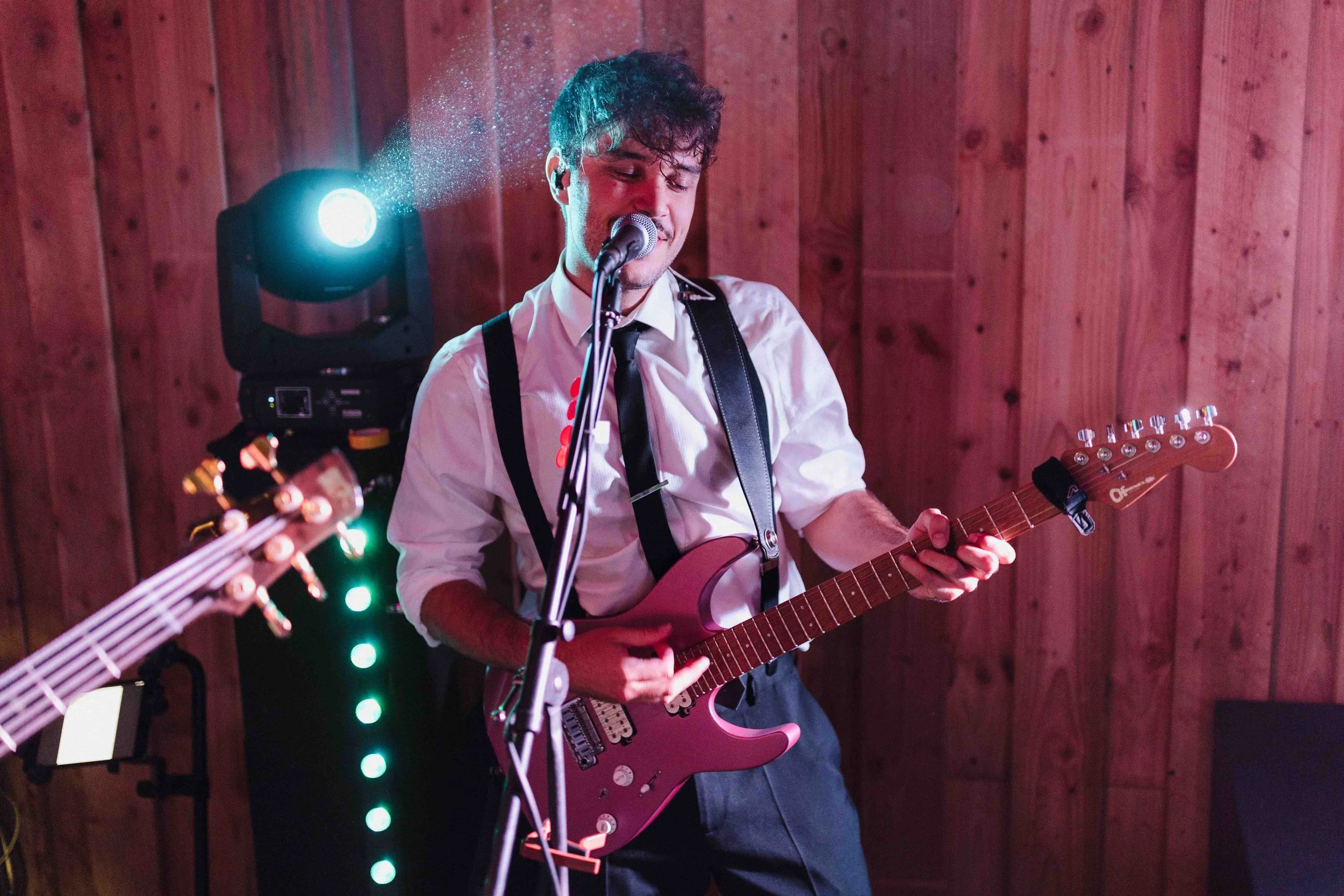 wallington based guitar teacher and performer plays guitar on stage live.