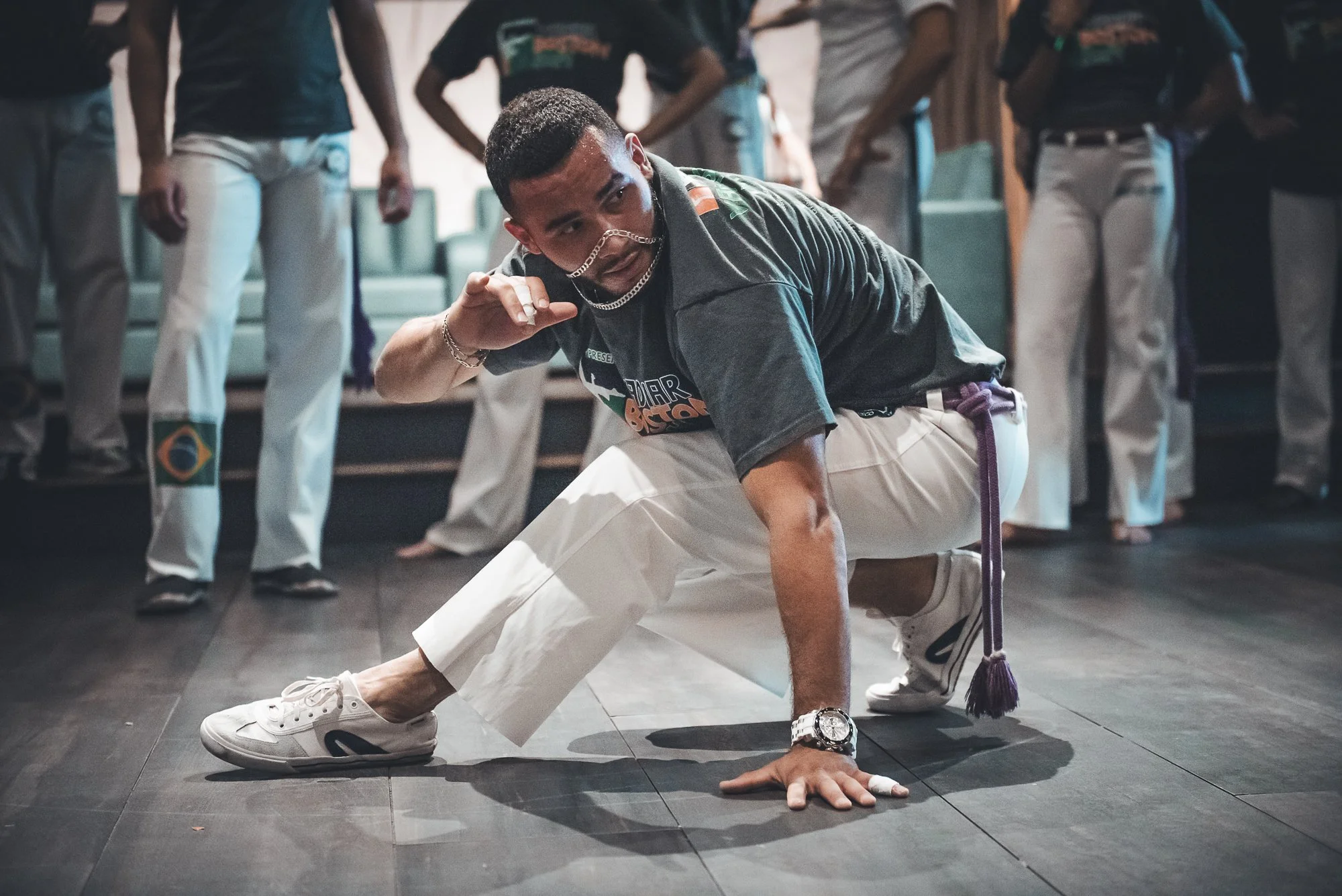 Roxbury Boston Capoeira Martial Arts, Man Crouched on Floor