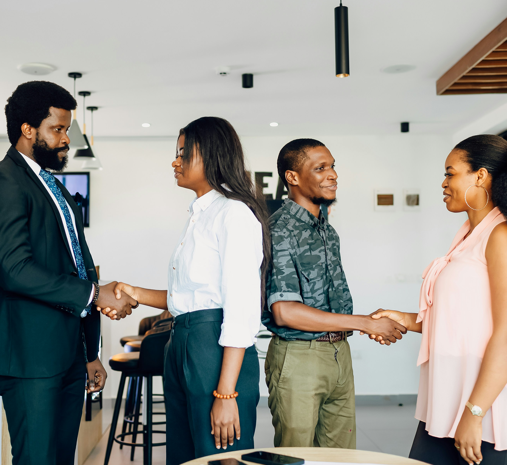 Financial services professionals greeting and onboarding — SunnyData's collaborative approach to Databricks implementation