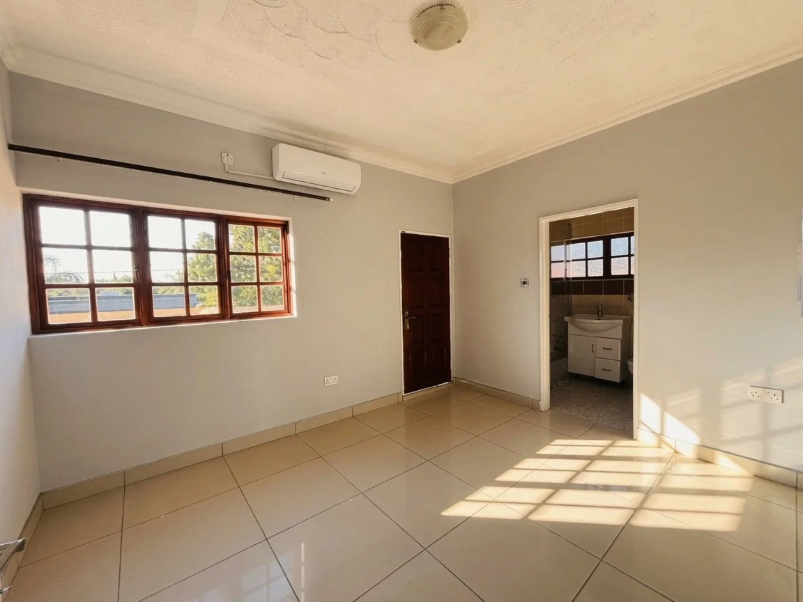 Ensuite bedroom at a Luxury 4 Bedroom Double-Storey Home in Phakalane – Nest 165/2026