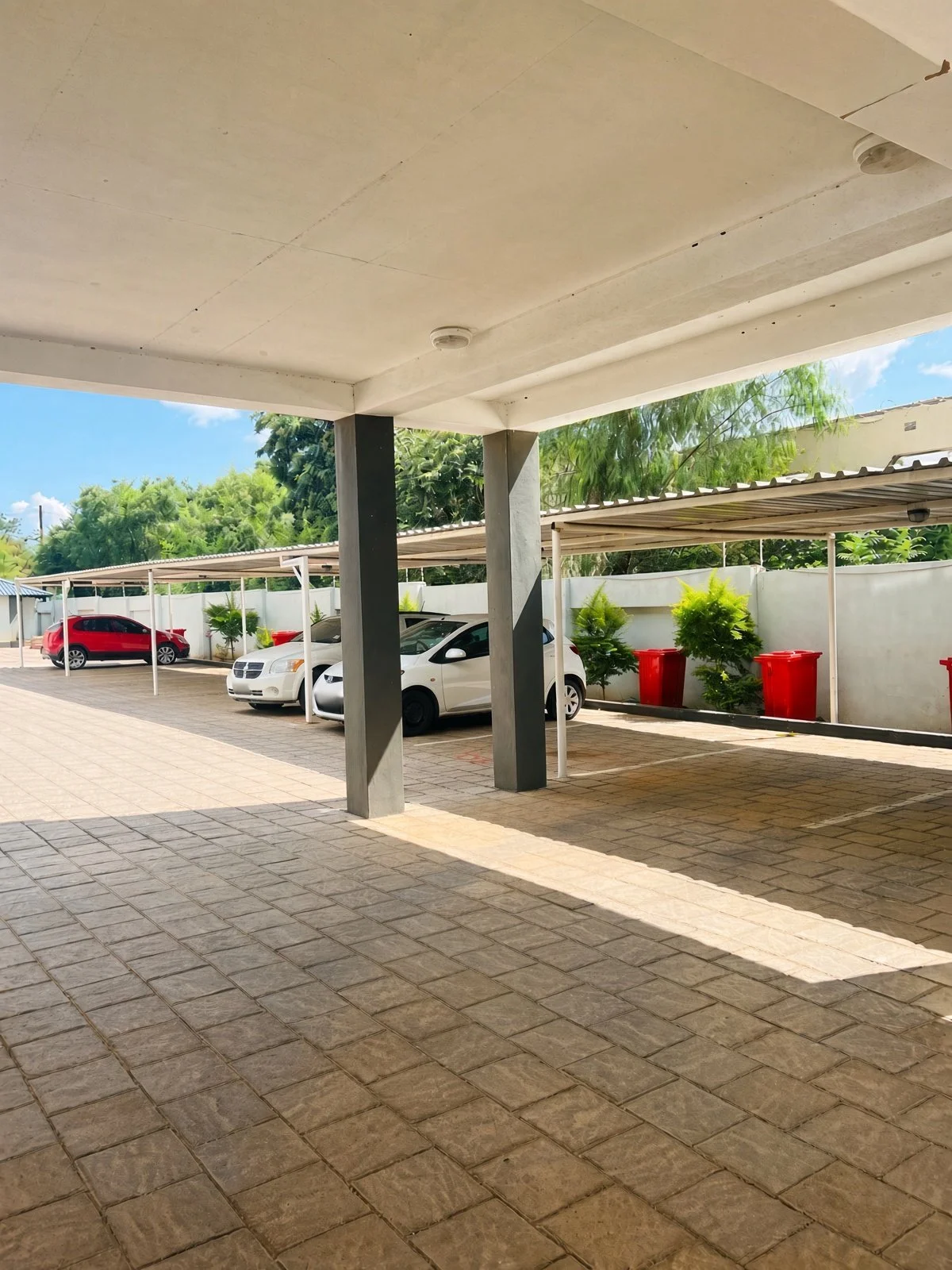 Covered parking bays in a secure walled complex, 2-bedroom apartment for rent in Extension 11 Gaborone
