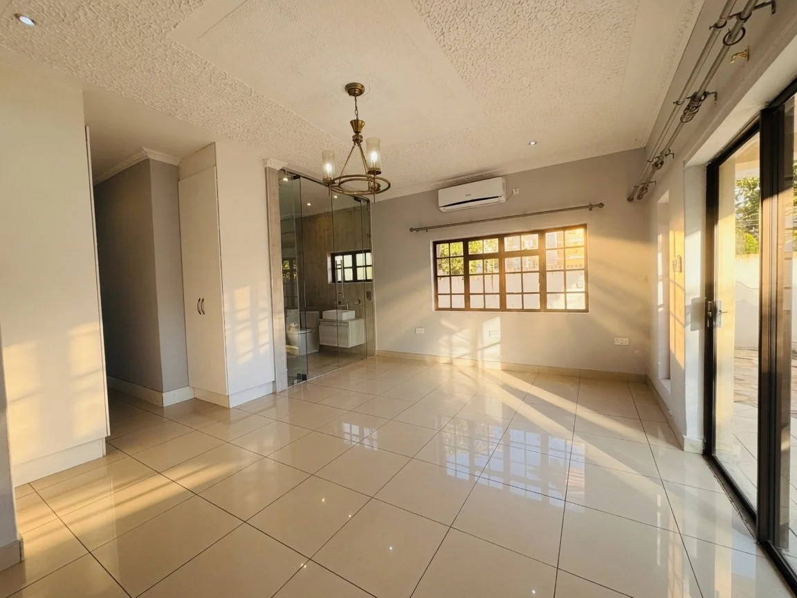 En-suite bedroom at a Luxury 4 Bedroom Double-Storey Home in Phakalane – Nest 165/2026