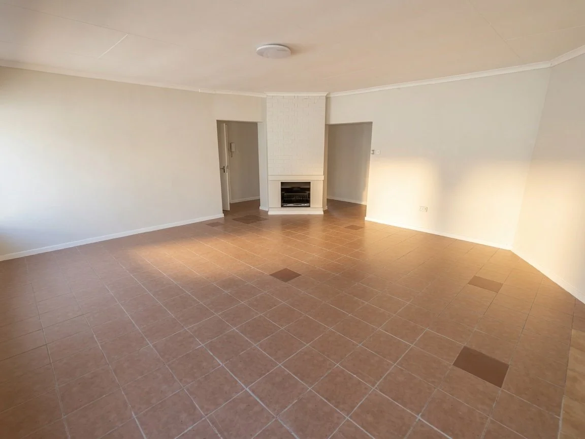 Lounge with fireplace at 3 Bedroom Home in Secure Phakalane Estate – Nest 166/2026
