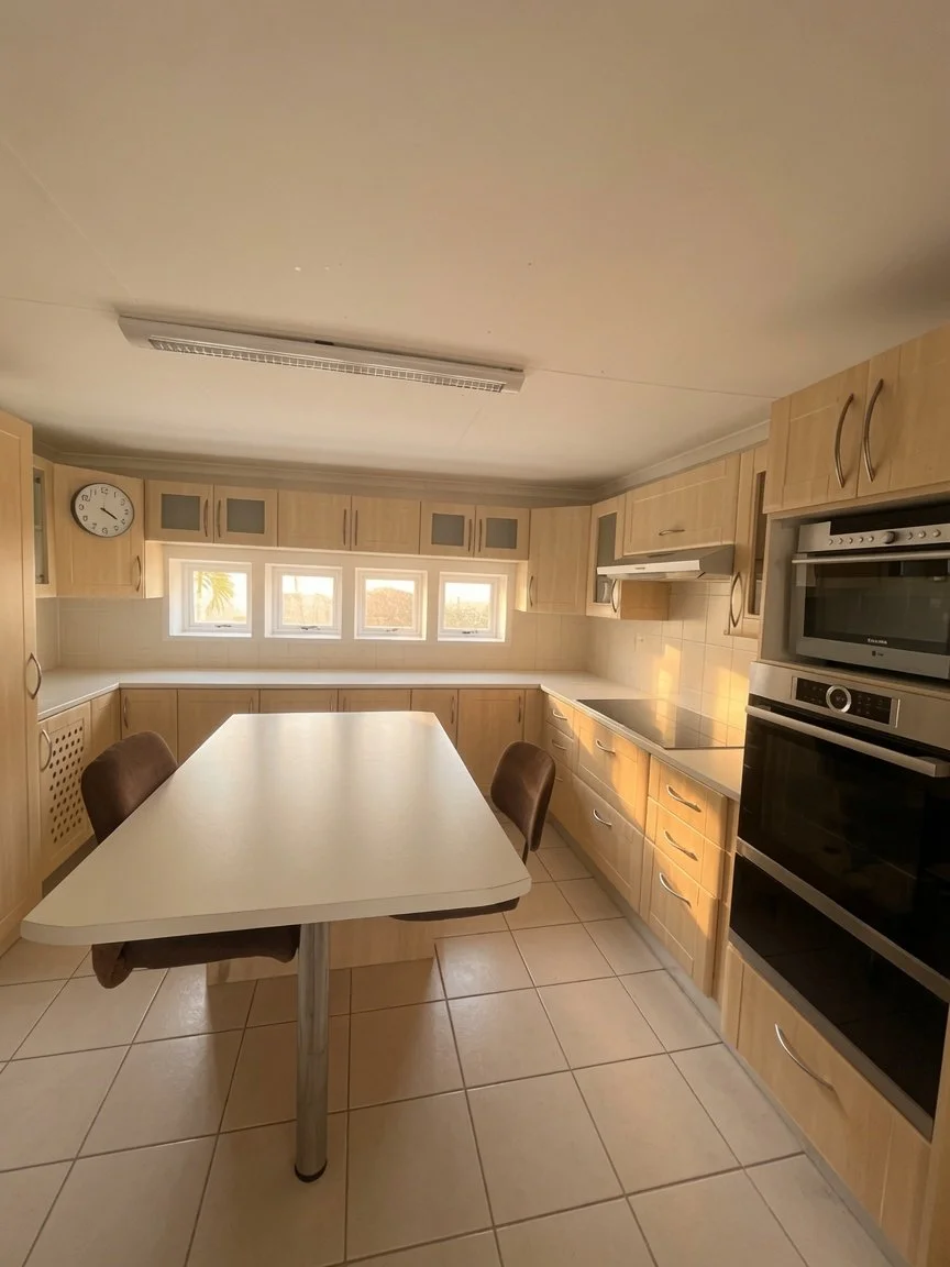 Fitted kitchen at an elegant 3 Bedroom Home with Pool in Phakalane – Nest 169/2026