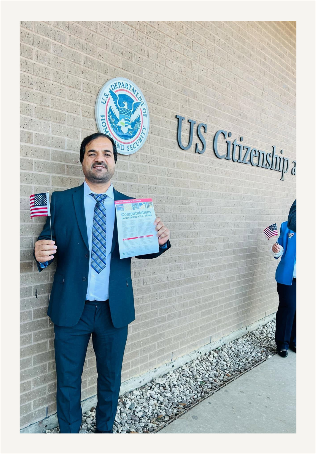 Joe Reagan's interpreter in Afghanistan helped keep Joe and his unit alive. This is a photo of him at his citizenship ceremony waiving a U.S. Flag.