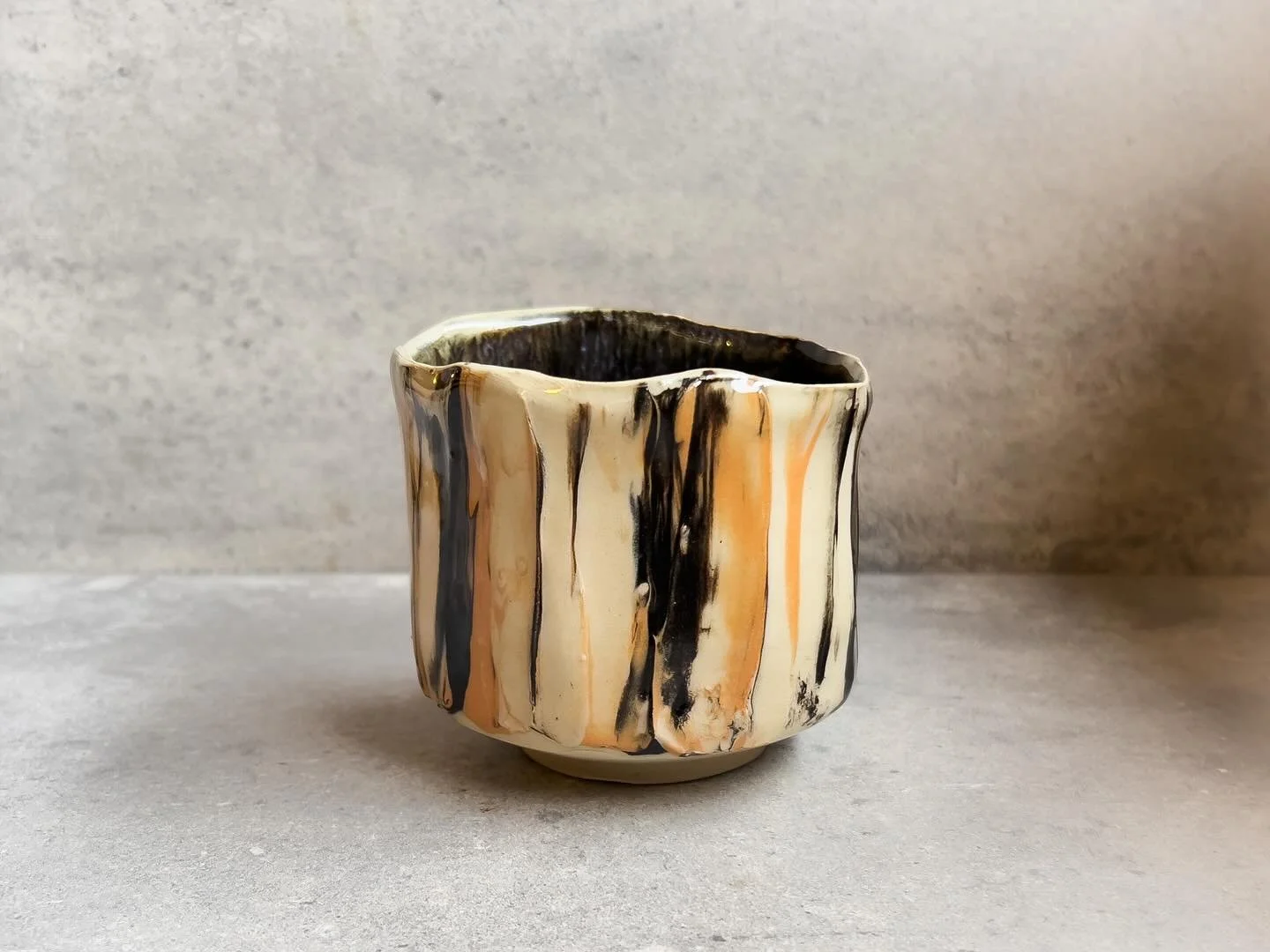 A recent tea cup made using different coloured slip and covered with a transparent glaze. I&rsquo;ve been  experimenting a lot with this colour palette and love the colours and texture on this cup. #pottery #teacup #handmadepottery #handmadeteacup #s
