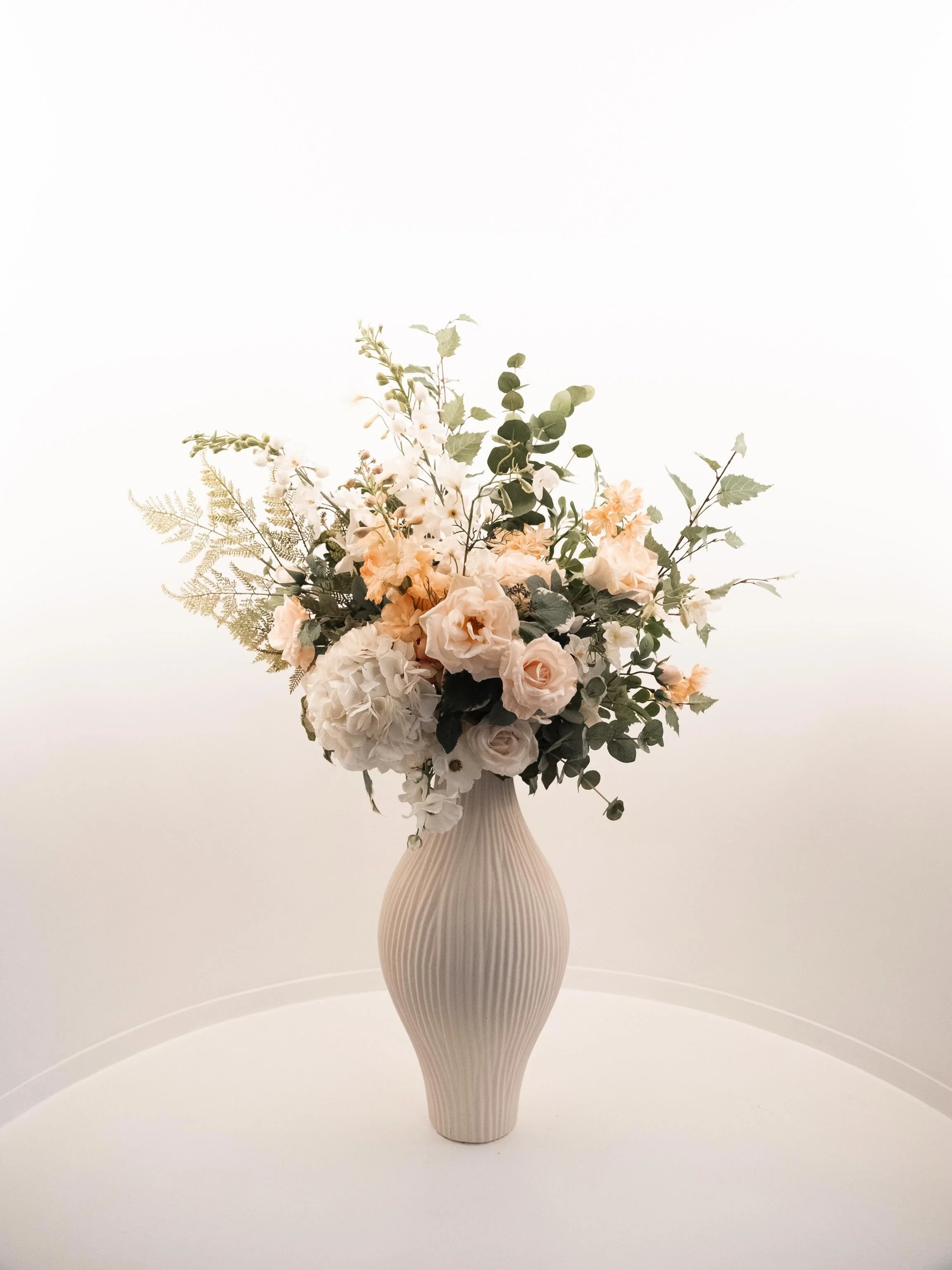 Flowers.

At a wedding, they&rsquo;re not just decoration, they carry the tone of the whole day. The palette, the mood, the level of care. Photographing them is like capturing the intent behind it all.

I love photographing because they give me a cha
