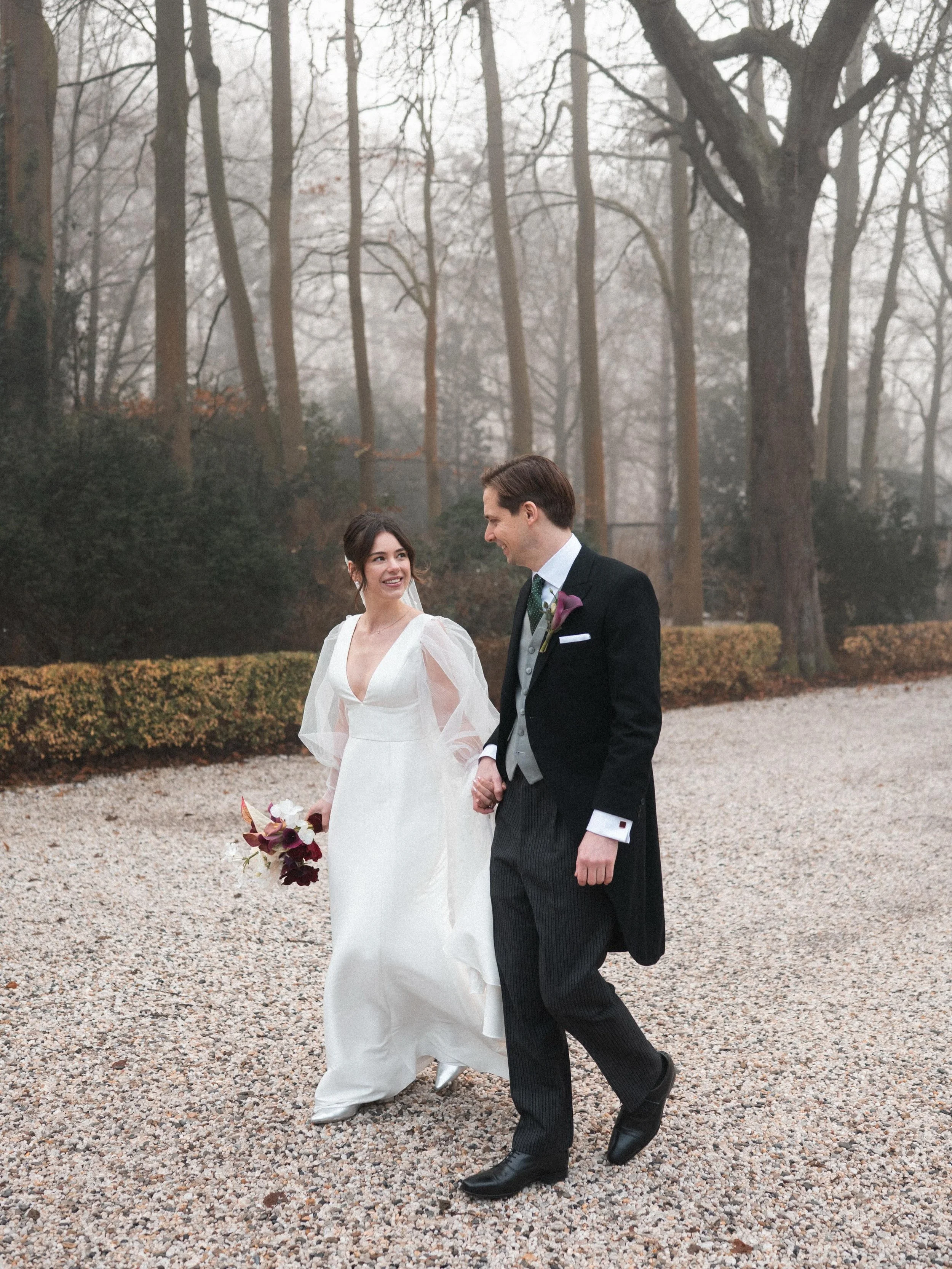 There&rsquo;s something about winter weddings like this that always stays with me.

A gentle walk, hands wrapped together, pulling in a little closer every few steps - not because they have to, but because it just feels natural.

No big direction, no