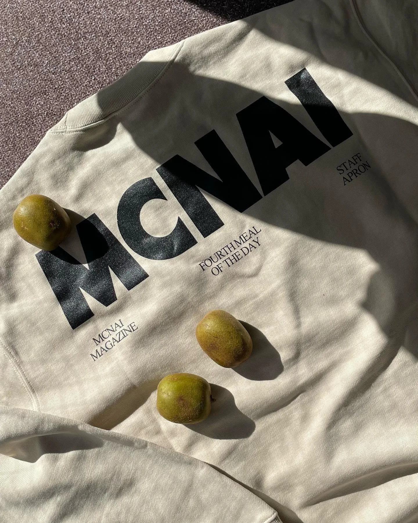 MCNAI &ldquo;Staff Apron&rdquo; Crewneck
available online this weekend