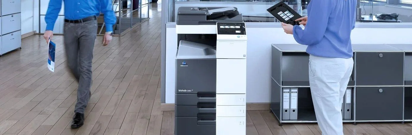 a konica minolta printer in a modern office