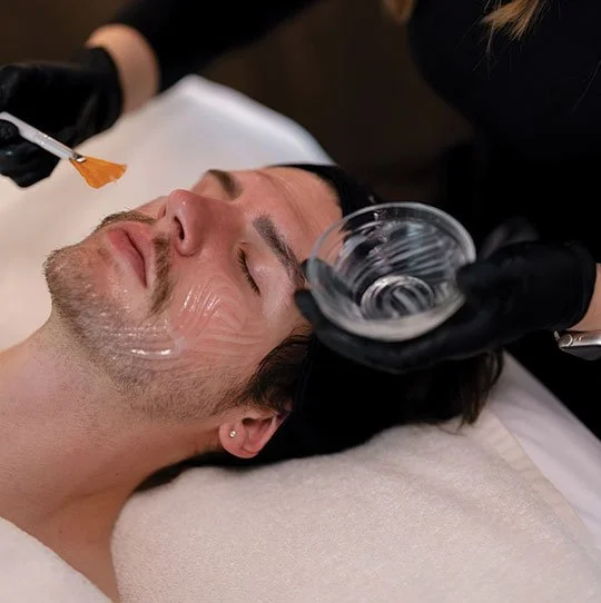 A man getting a spa treatment