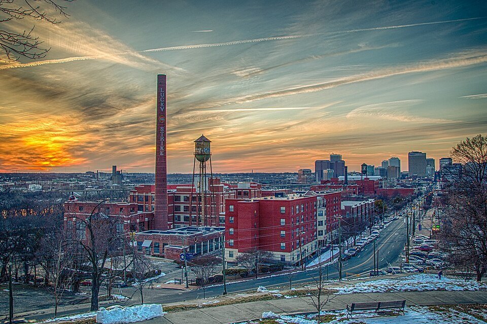 Richmond, Virginia skyline and riverfront at sunset