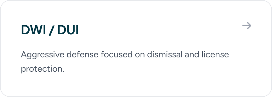 Slide with title DWI / DUI and the subtitle 'Aggressive defense focused on dismissal and license protection' with an arrow icon on the right.