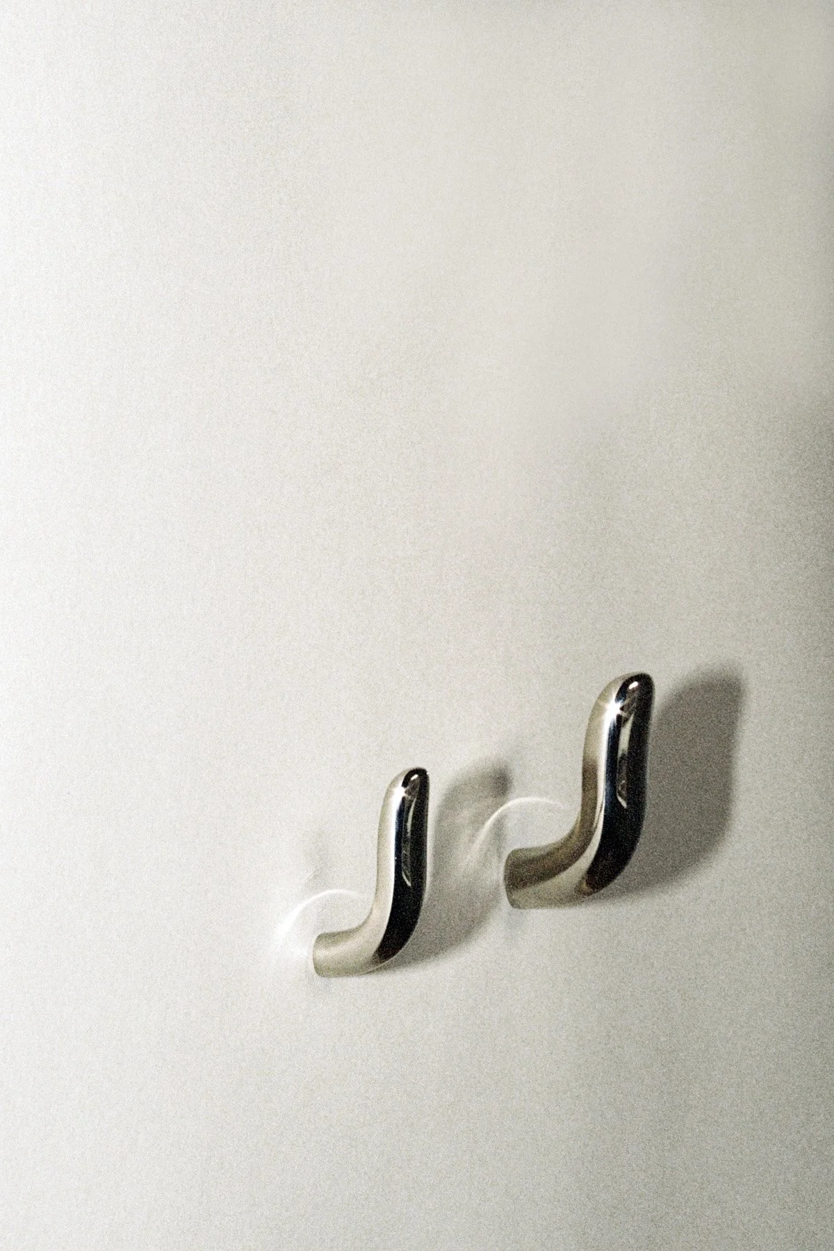 IRIS & NOOR POLISHED NICKEL PAIRING.jpg