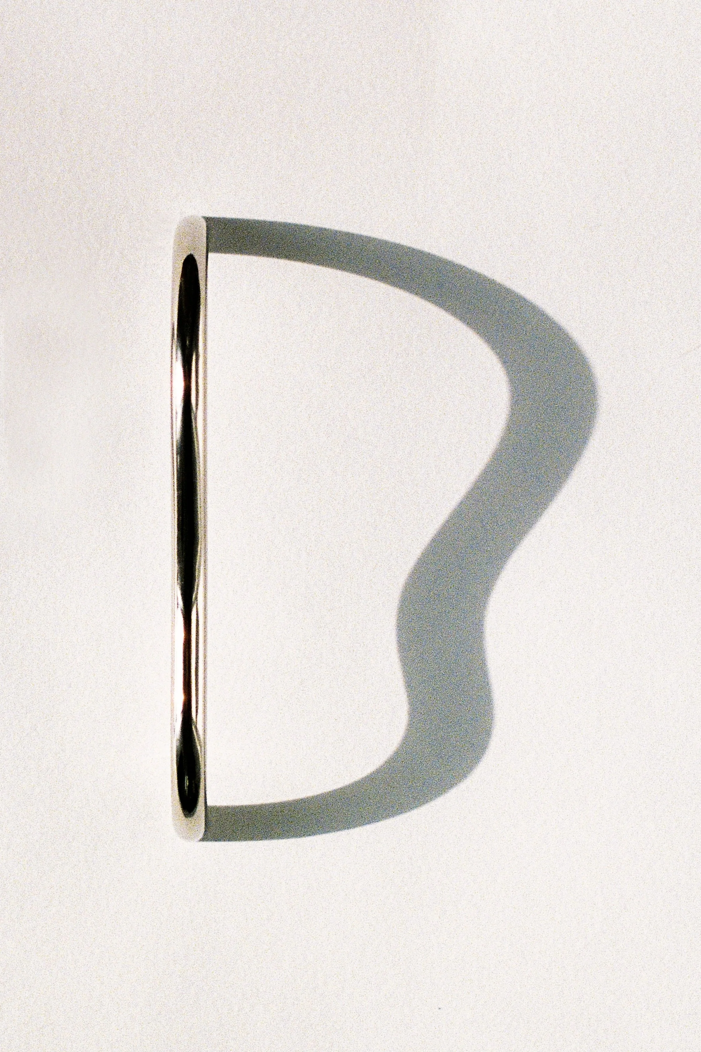 SPACES WITHIN - LIMBER POLISHED NICKEL.jpg