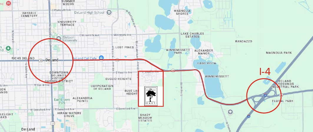 Map showing routes from downtown DeLand and the intersection of I-4 to the right, with red circles highlighting these locations and a route connecting them through some neighborhoods and lakes.