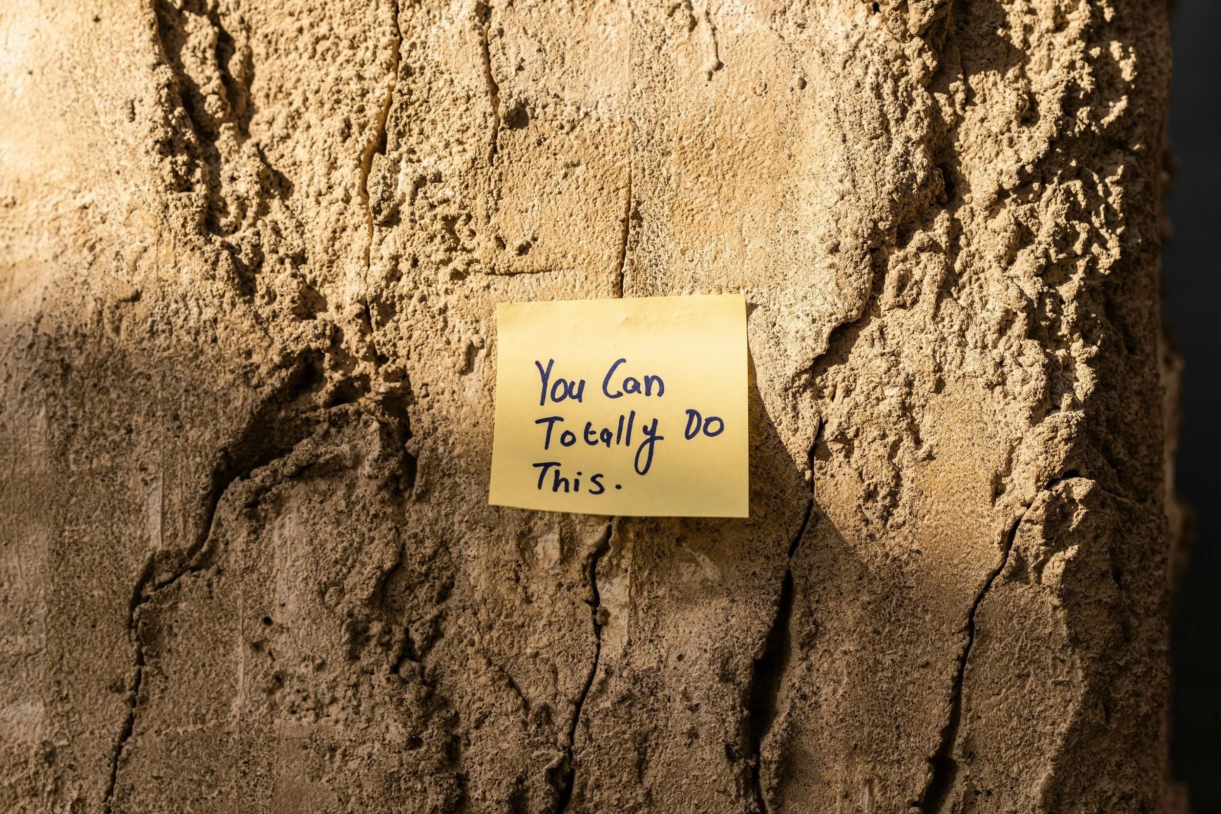 sticky note with message you can totally do this on a stone wall
