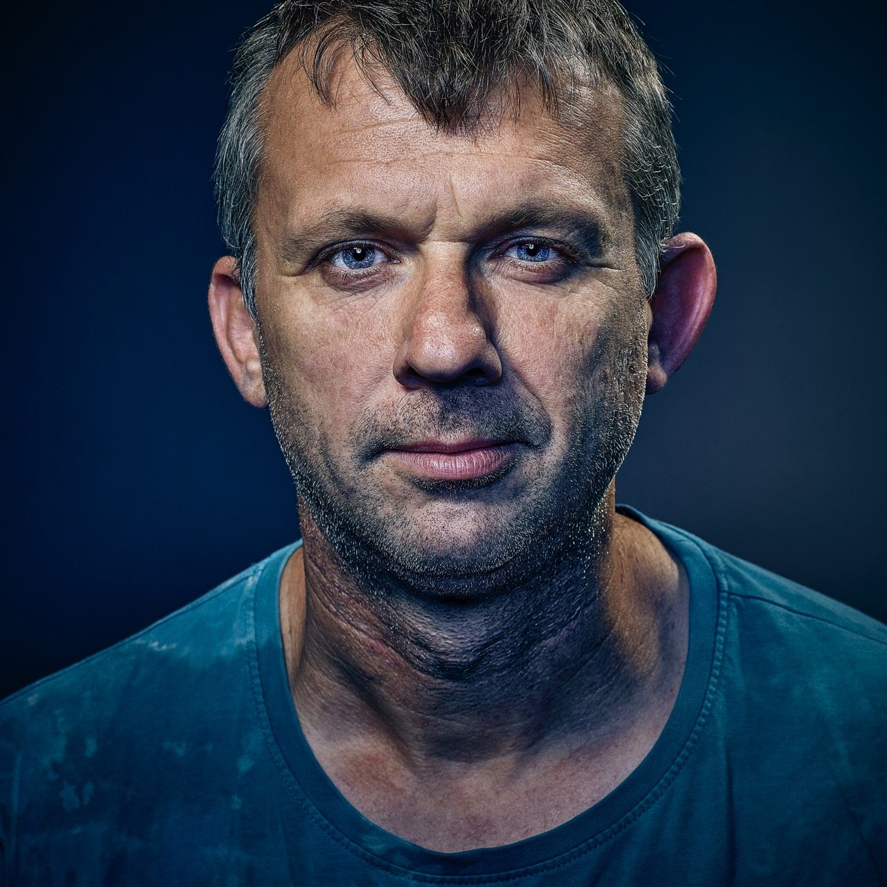 contemporary portrait, advertising portrait, striking portrait of middle age male  