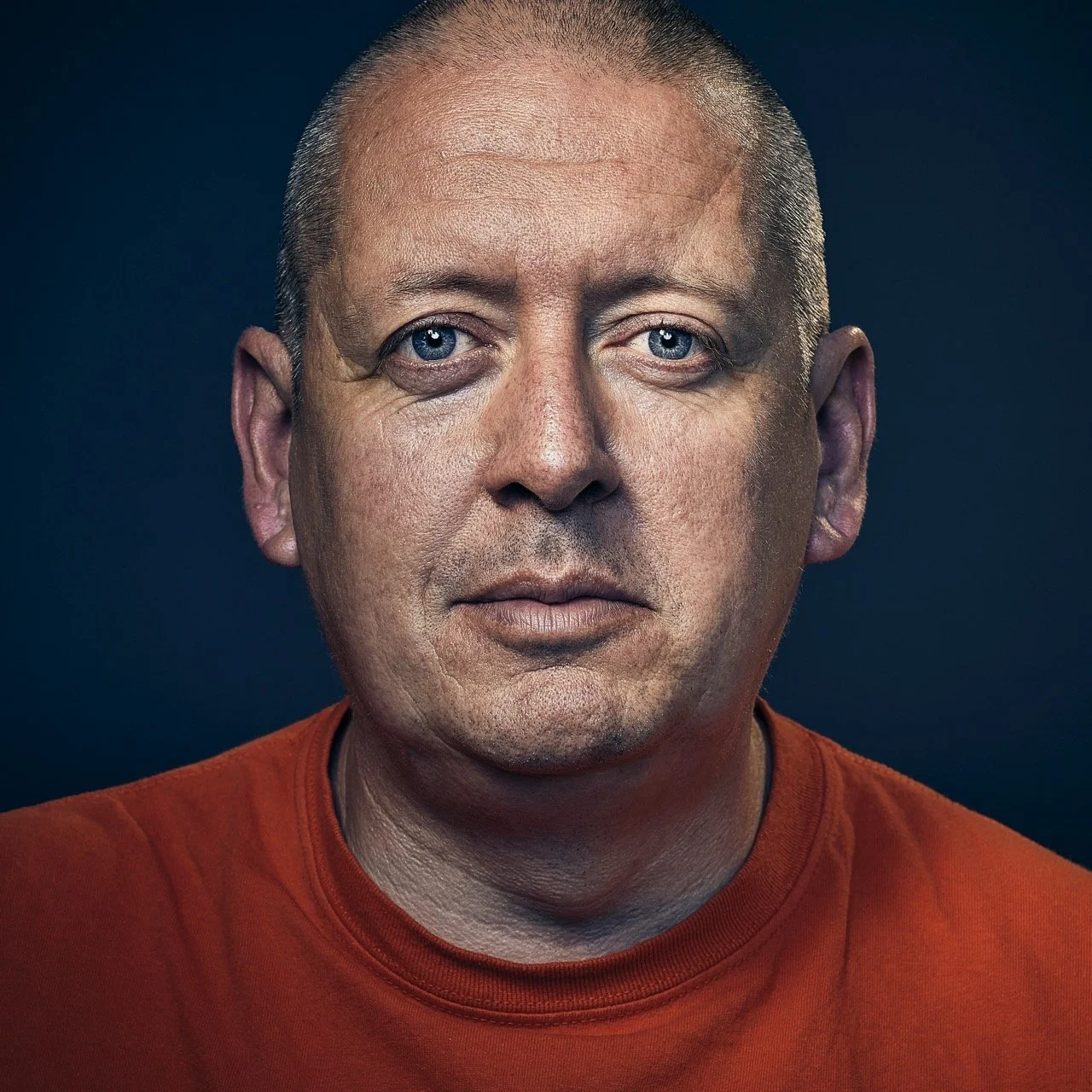 contemporary portrait, advertising portrait, striking portrait of middle age male  