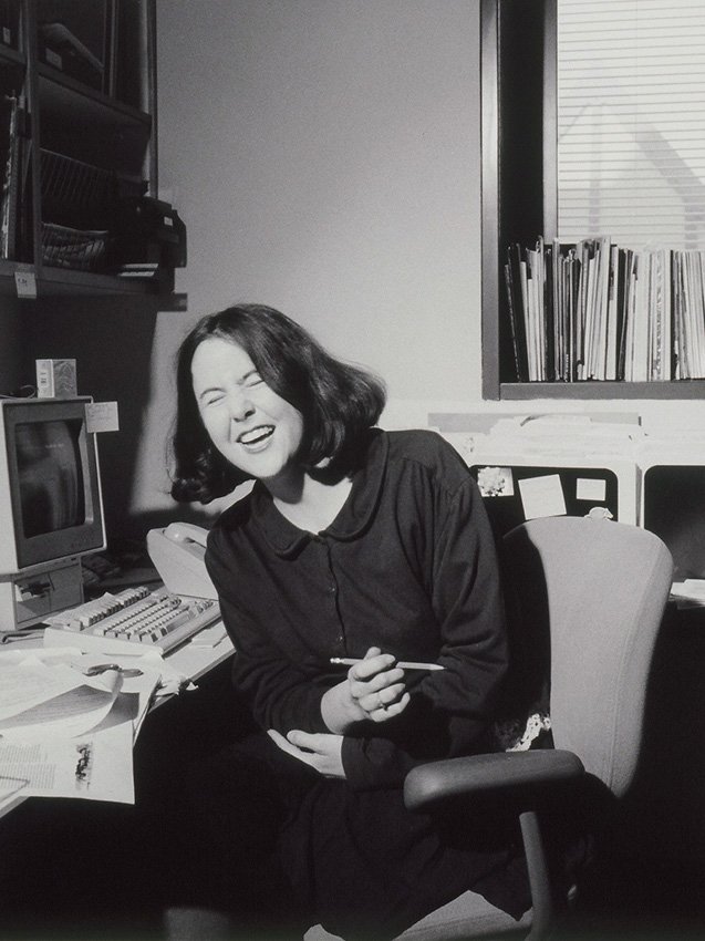 Laughing at work with a pointed object (Michelle) / gelatin silverprint / 20" x 16"