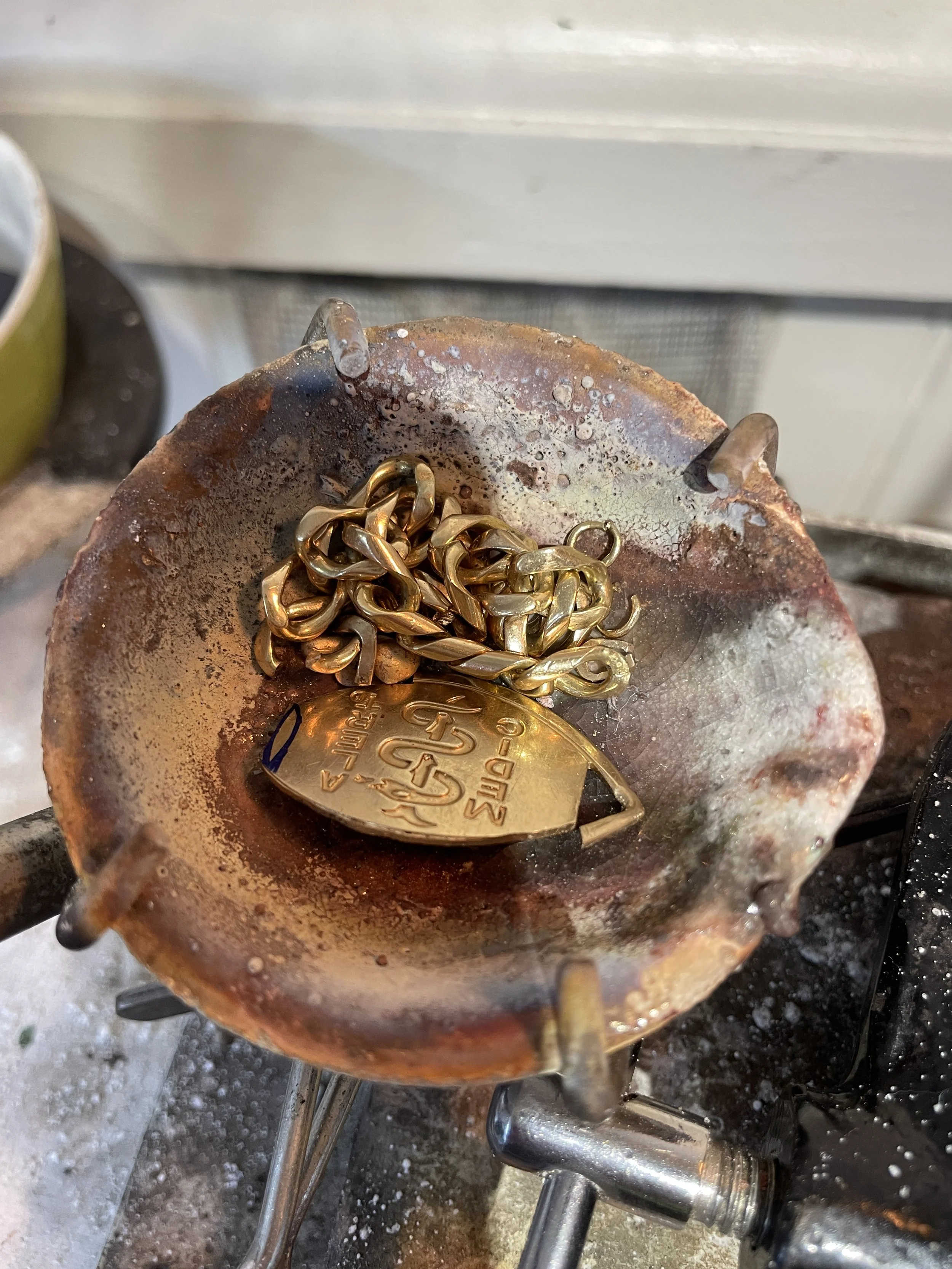 Loved one’s solid gold medical bracelet recycled into three heart pendants for loving wear in memory. 
