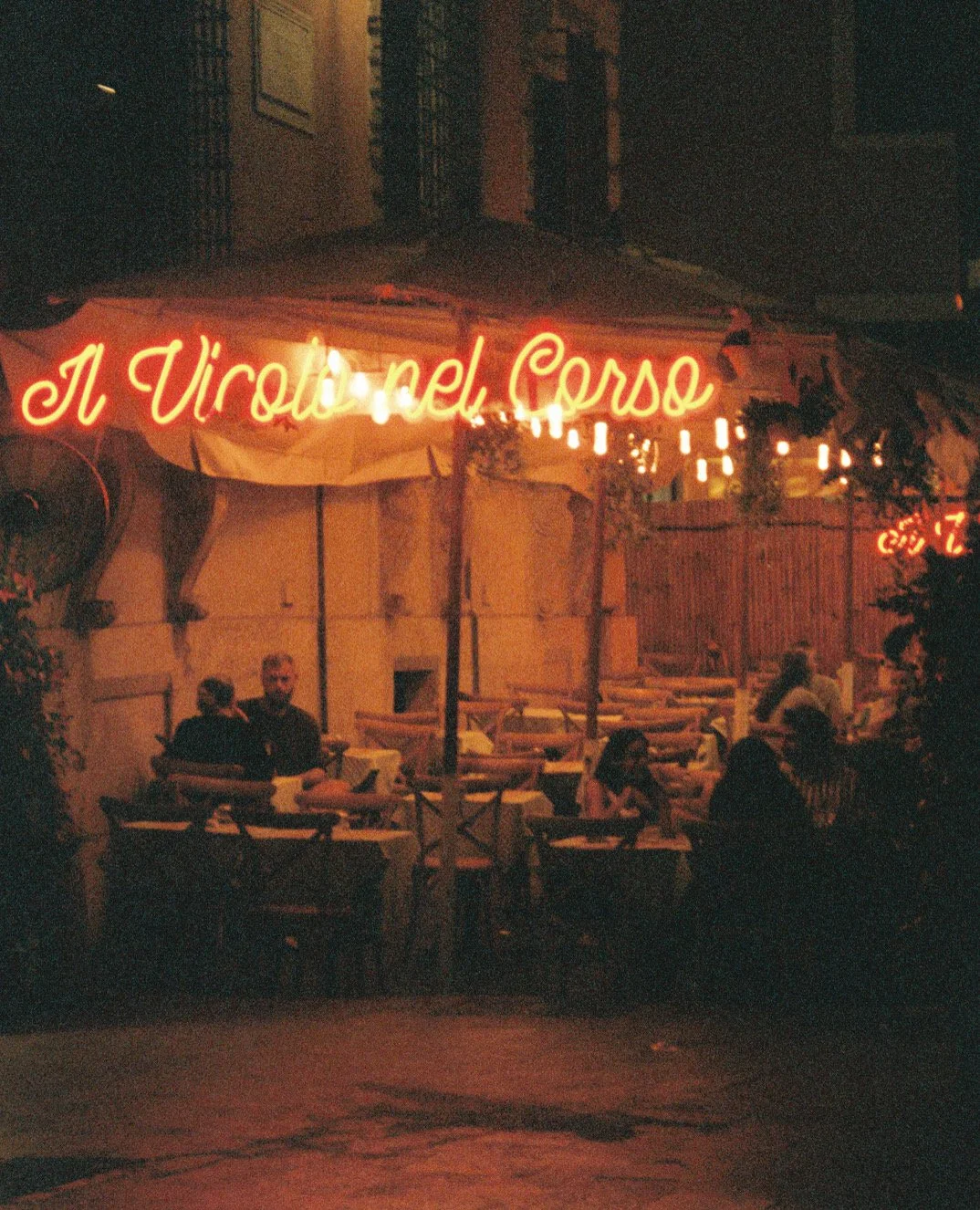 film photo of a romantic Italian restaurant in Italy