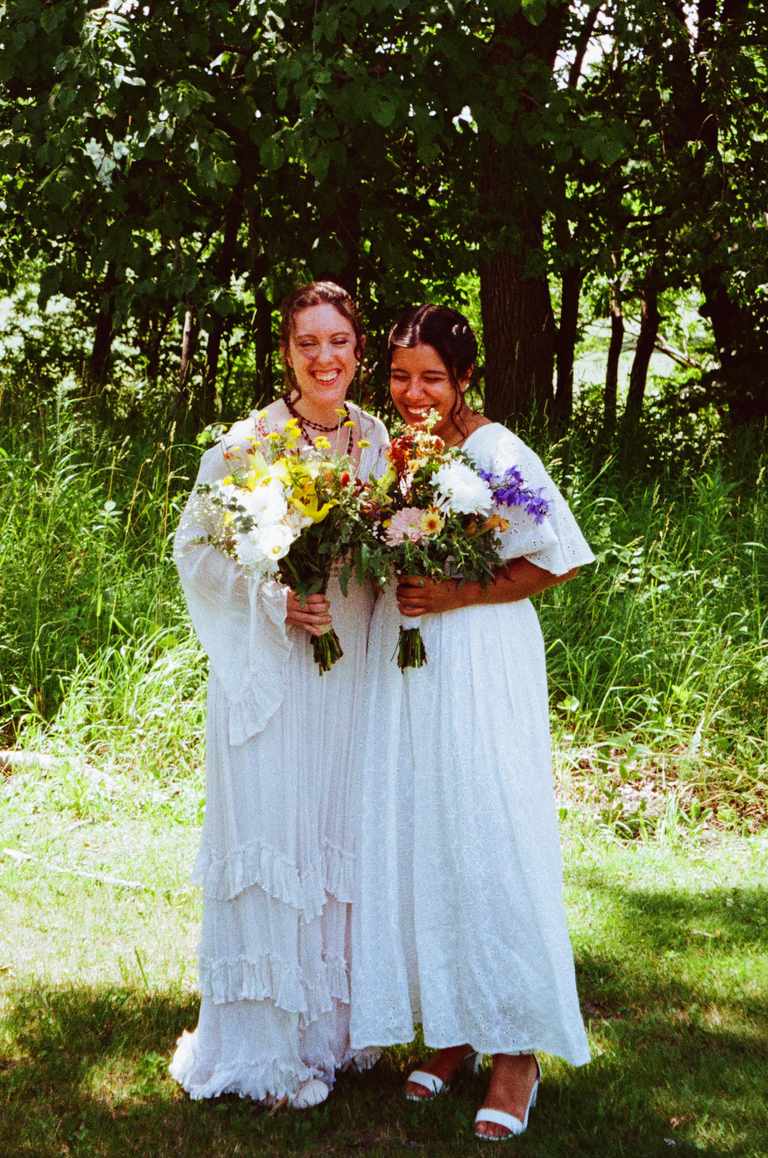 Film portrait of two brides on their summer wedding day in Chicago