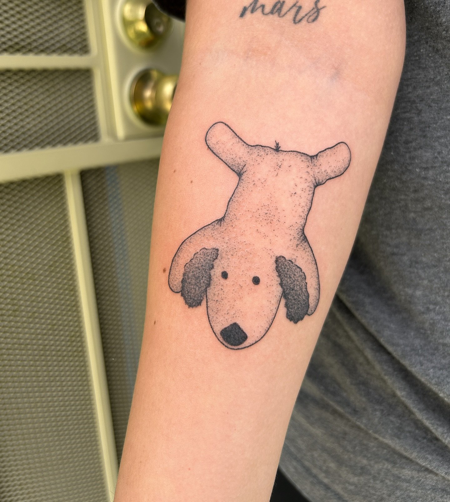 A dog toy and healed clown walk into a post
