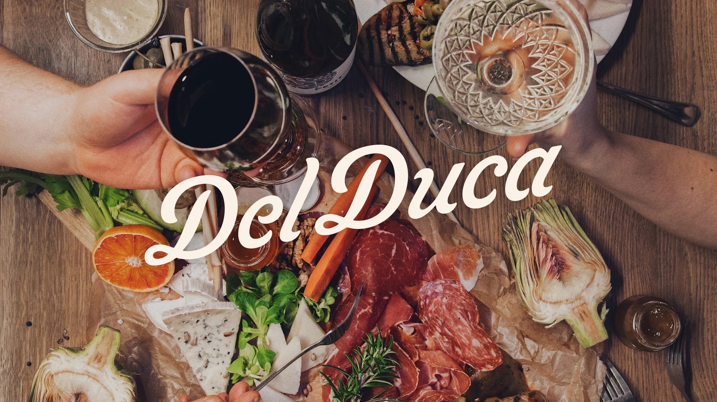 Del Duca friends dinner party cheers