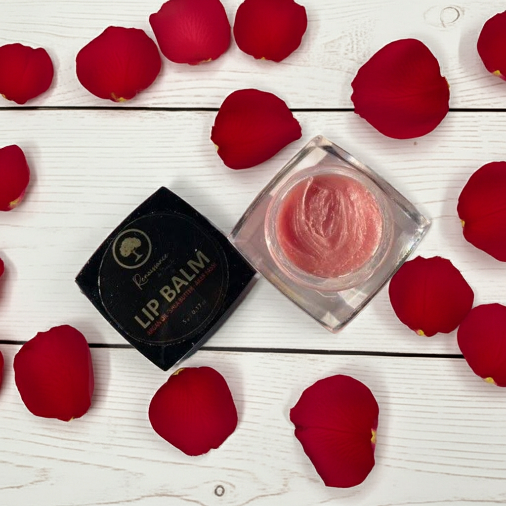 Aker-Fassi-Hydrating-Lip-Balm-on white wood and rose petals.png