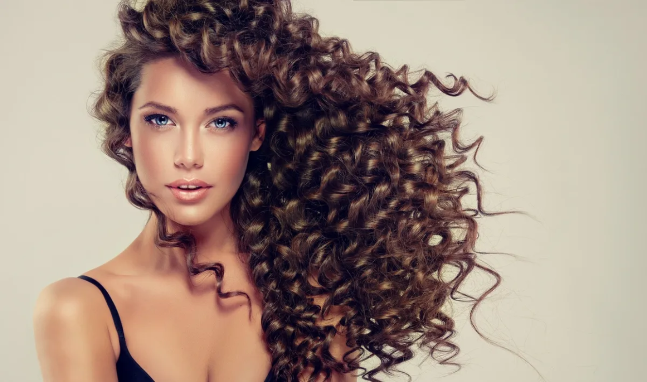 Curly haired model for deep hydration hair care Studio-Project.png