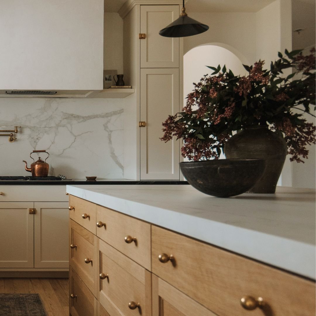 Can you mix countertops in a kitchen? Our answer is yes! There are numerous things to consider when mixing countertops. You want to make sure that the countertops aren't too close in color, or it will just look like a bad, mismatched slab. The materi