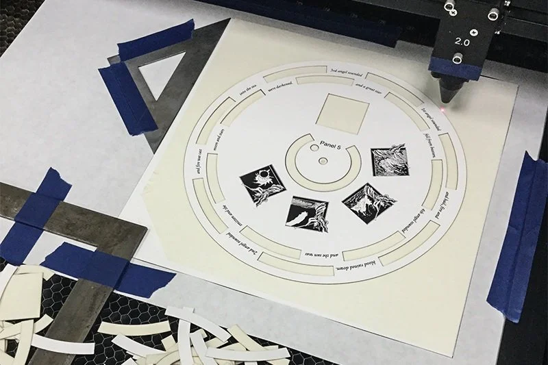 FreeFallLaser_CuttingPaper.jpeg