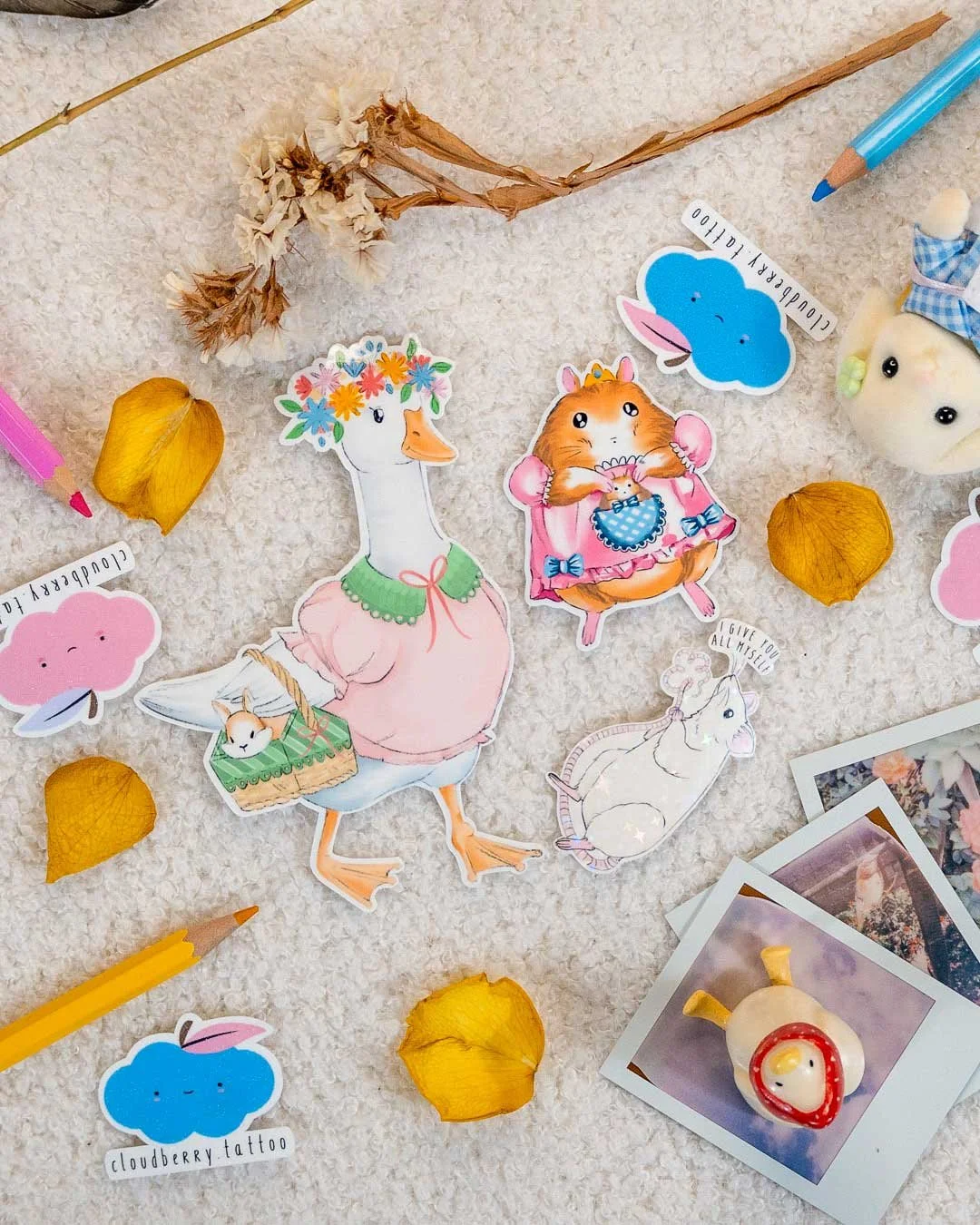 Multiple stickers of a cartoon-style white goose with a flower crown, green collar, pink dress, and holding a basket with a bunny inside, along with a kawaii princess hamster and a rat, all in a cute pastel cartoon style.