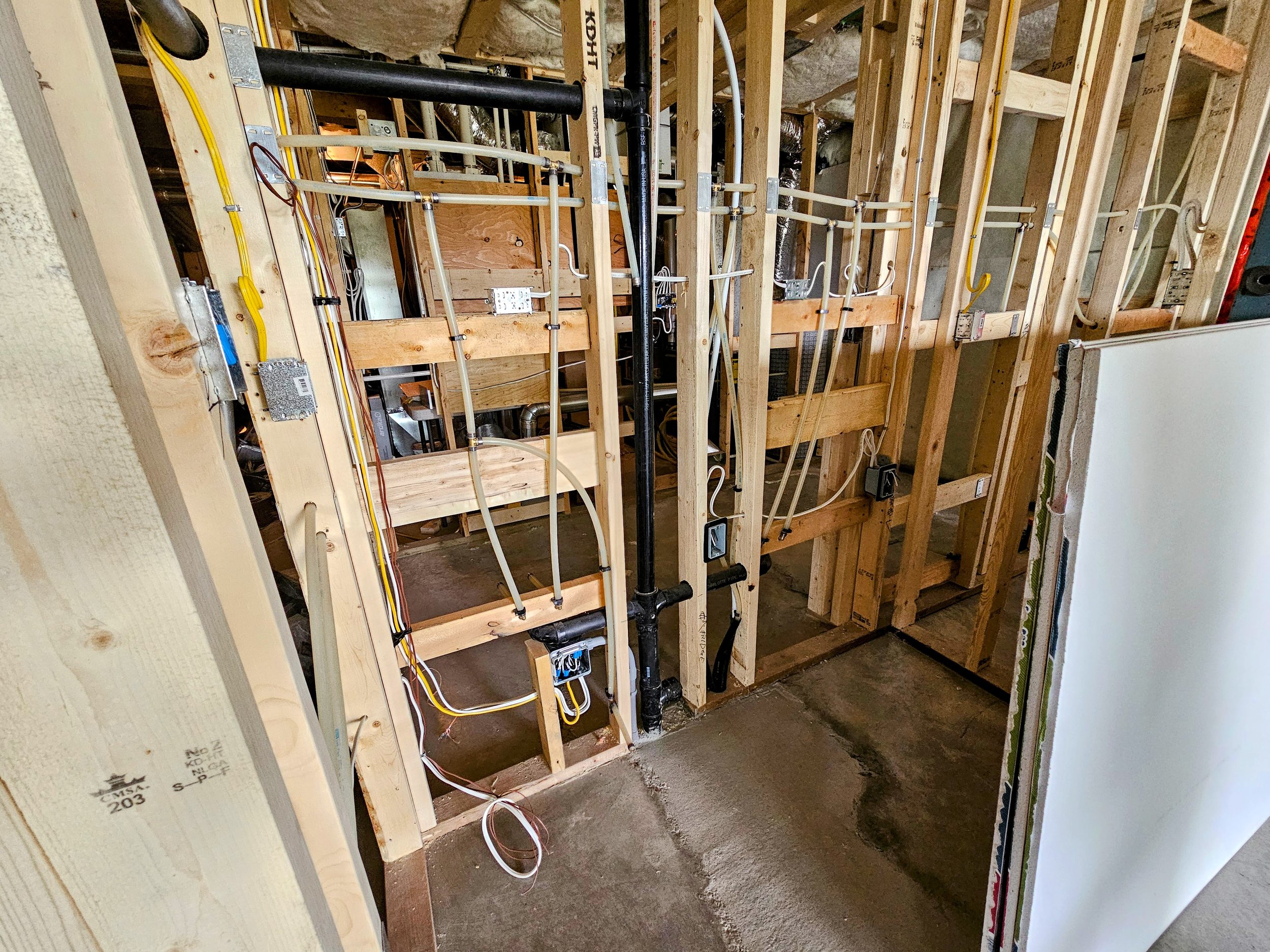 CEC 2024 compliant electrical rough-in for secondary suite development Calgary