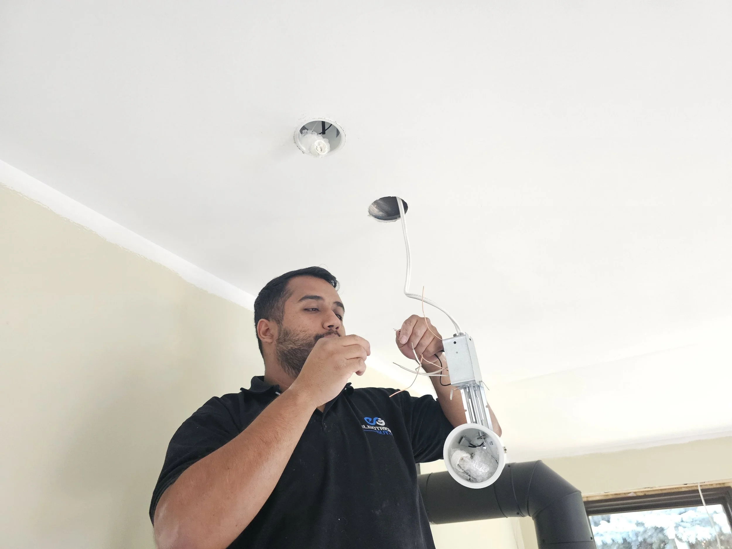 Master Electrician performing electrical rough-in for Calgary home renovation