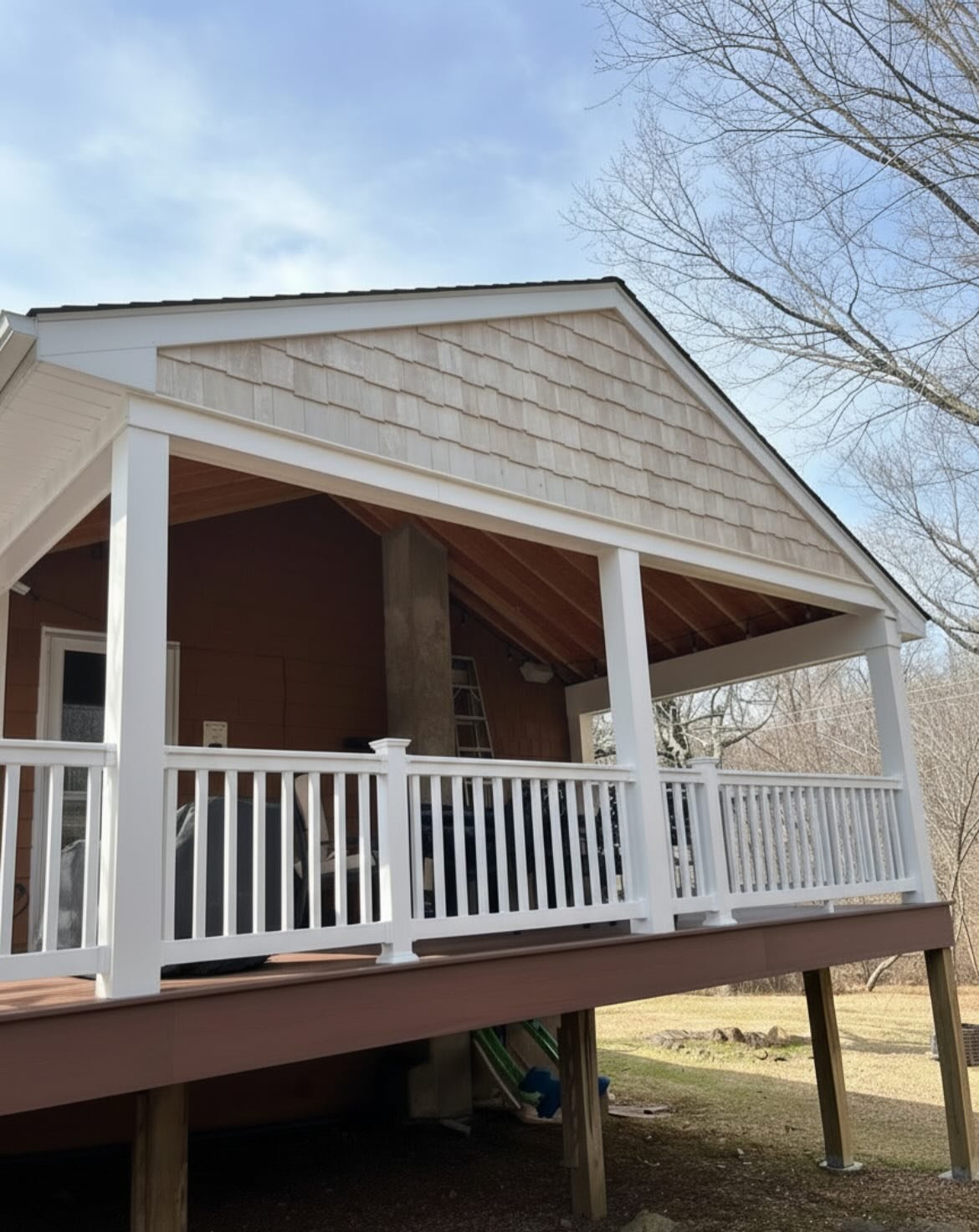 Awesome upgrade to this deck! No more soggy cushions or faded furniture! Rain or shine this custom pergola provides a weatherproof spot to enjoy the outdoor air!