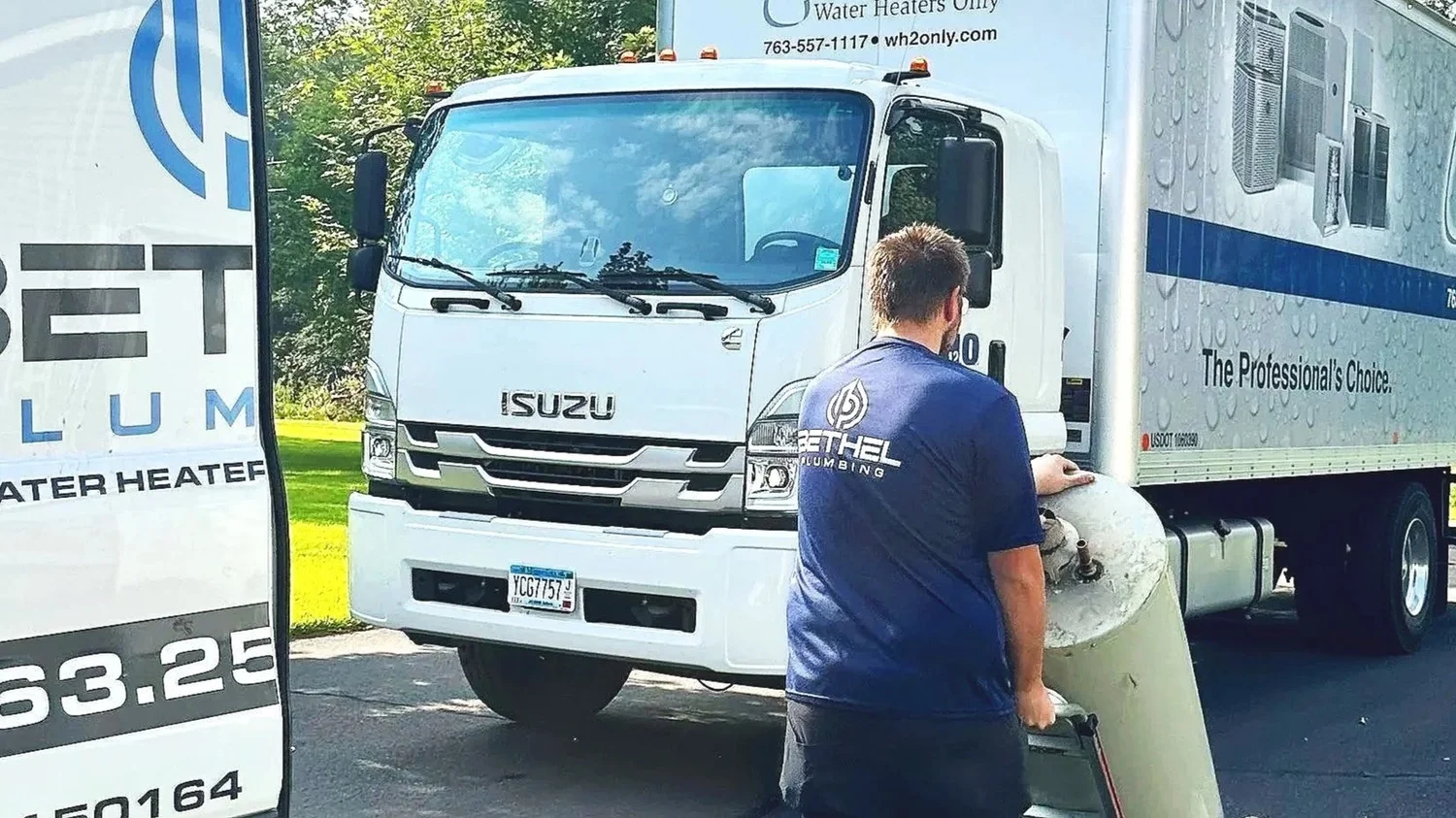 Bethel technician delivering a water heater