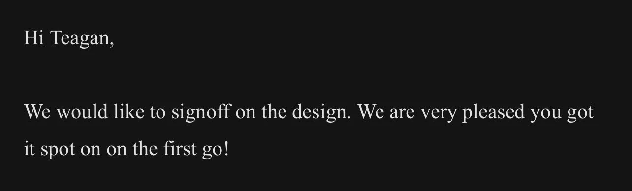 Email message with a black background and white text. The message approves a design sign-off, indicating the recipient was successful on the first attempt.