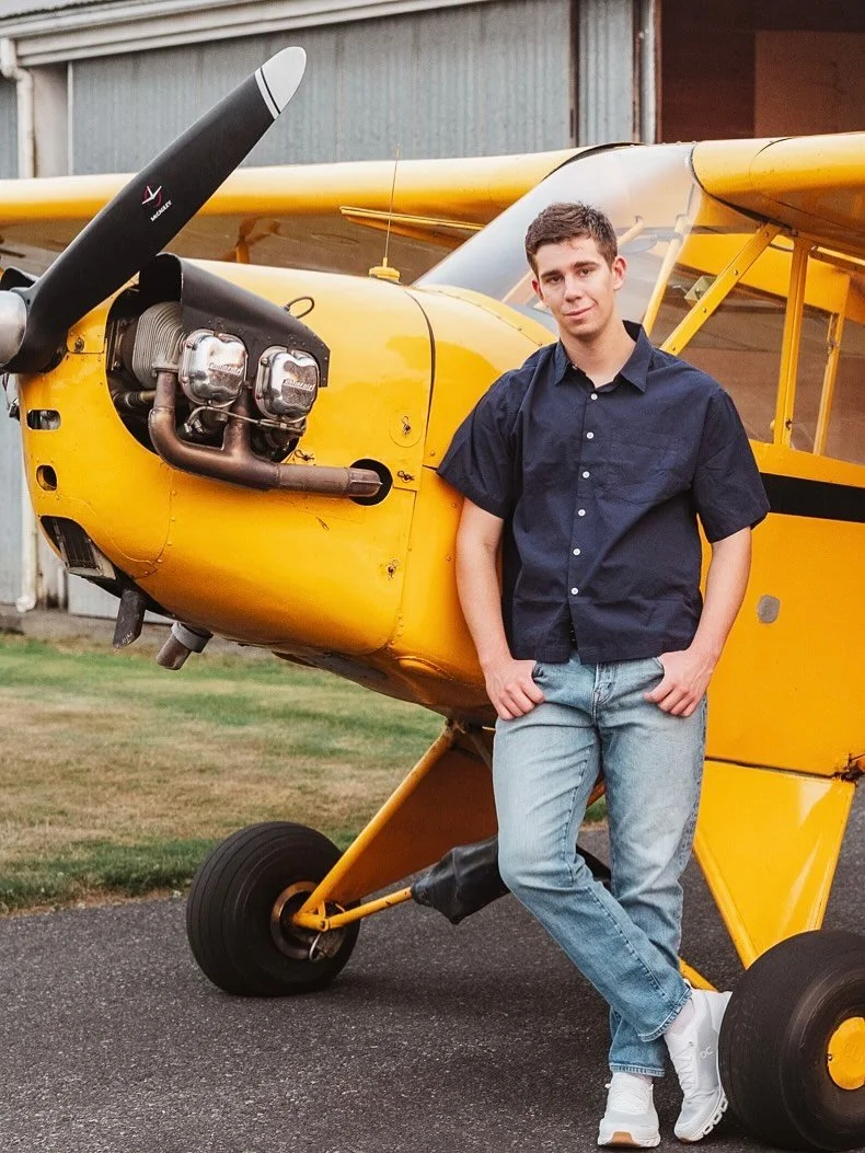 I live for sessions like these. When mom asked if I could feature his learning to fly in his senior session, I was thrilled! The setting, the angles of the plane - not the norm, but oh my goodness I love the result.  Plus, he did the number one thing