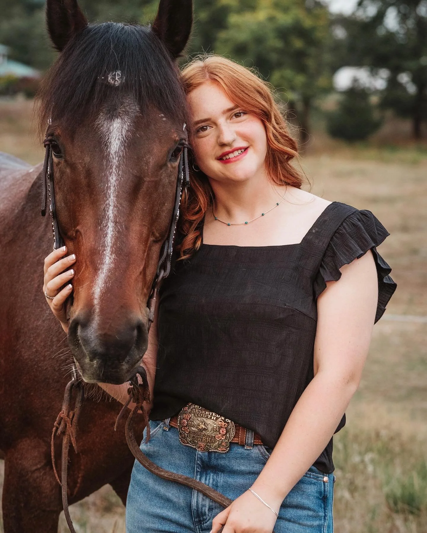 I&rsquo;ve done senior photos for all three siblings in this family, and now here we are, celebrating the youngest! I could not have been more excited when they asked if we could do the shoot with her horse Rowdy in the stable fields.  The light was 